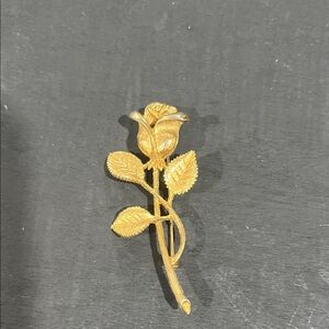 Gold rose brooch